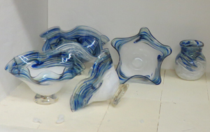 Blown glass bowls cool slowly in a kiln to prevent cracking.