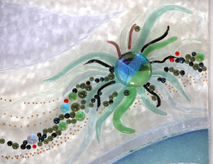 This artistic rendering of a sea anemone was created in fused glass by Mary Barron as part of a three-piece underwater landscape. (From a photo by Rick Barron)